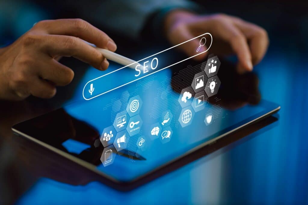 SEO written above a floating computer UI