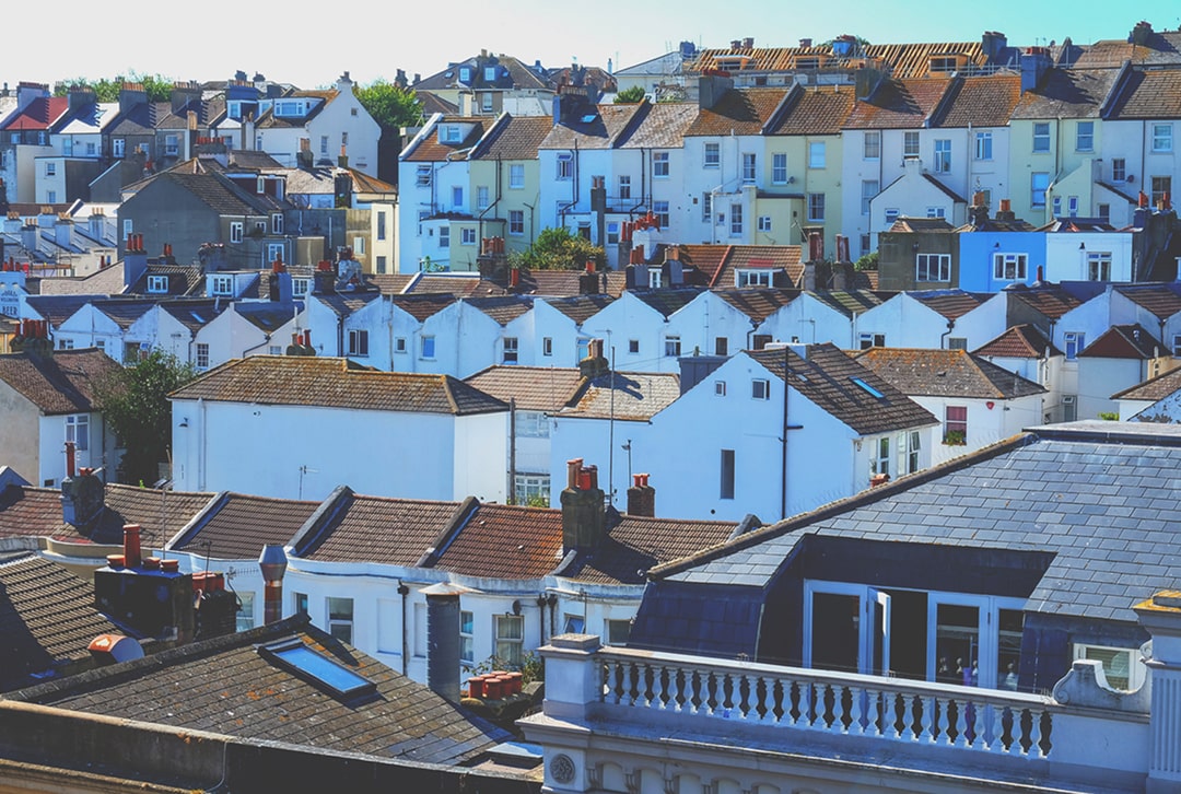 image of rooftops and staggered rows of houses in brighton